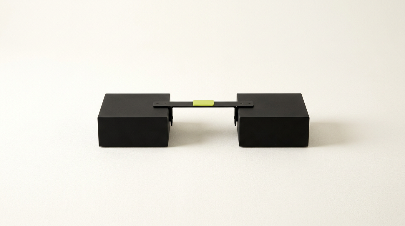 Two matte black blocks joined across the gap between them by a single black bracket with one acid-lime plate at the joint.